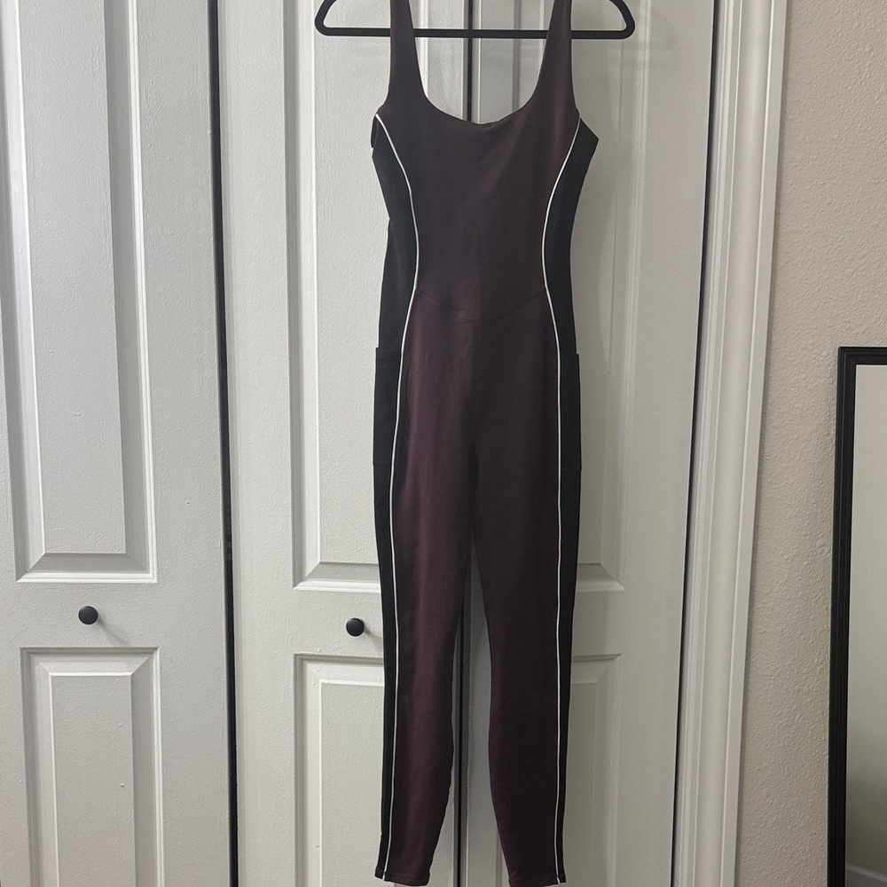 Fabletics Plum and Black Sleeveless Colorblock Jumpsuit with White Piping